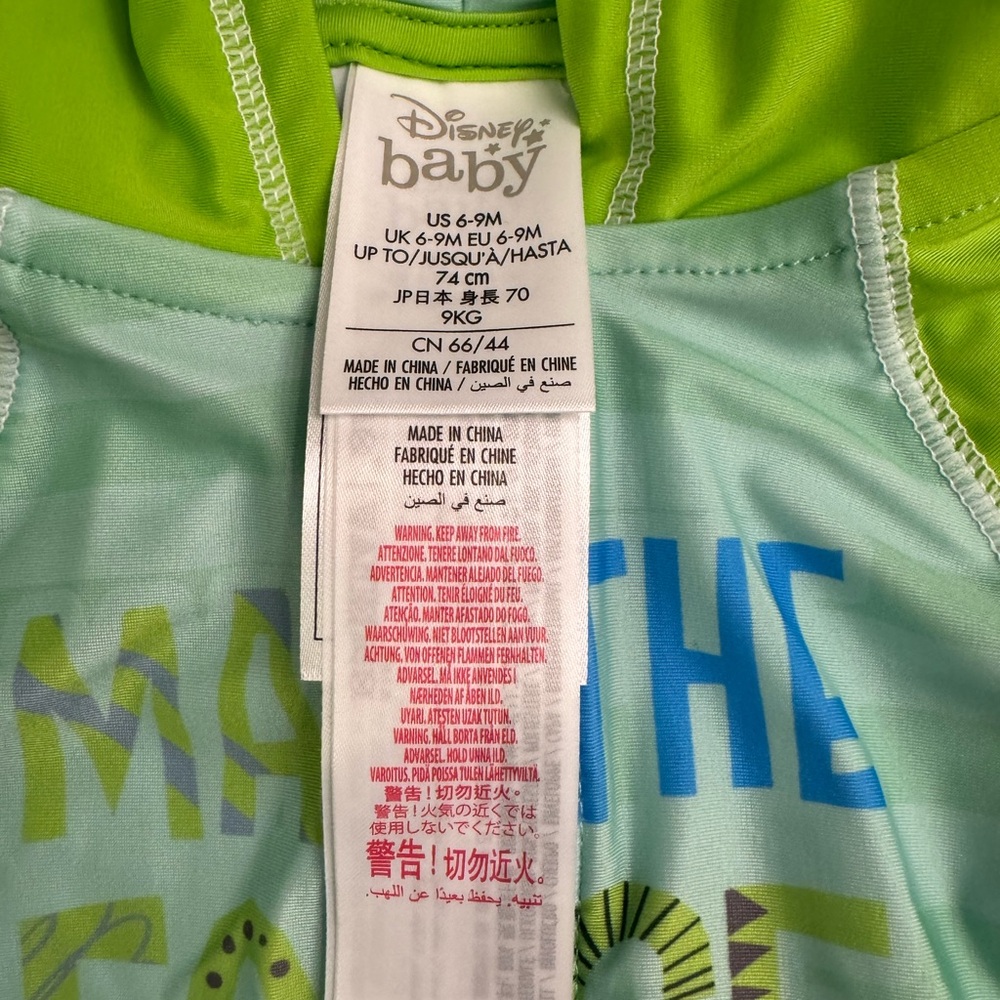Disney Baby Yoda swim trunks and matching swim top with hood